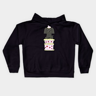 Happy black dog Jumping out of a cake Kids Hoodie